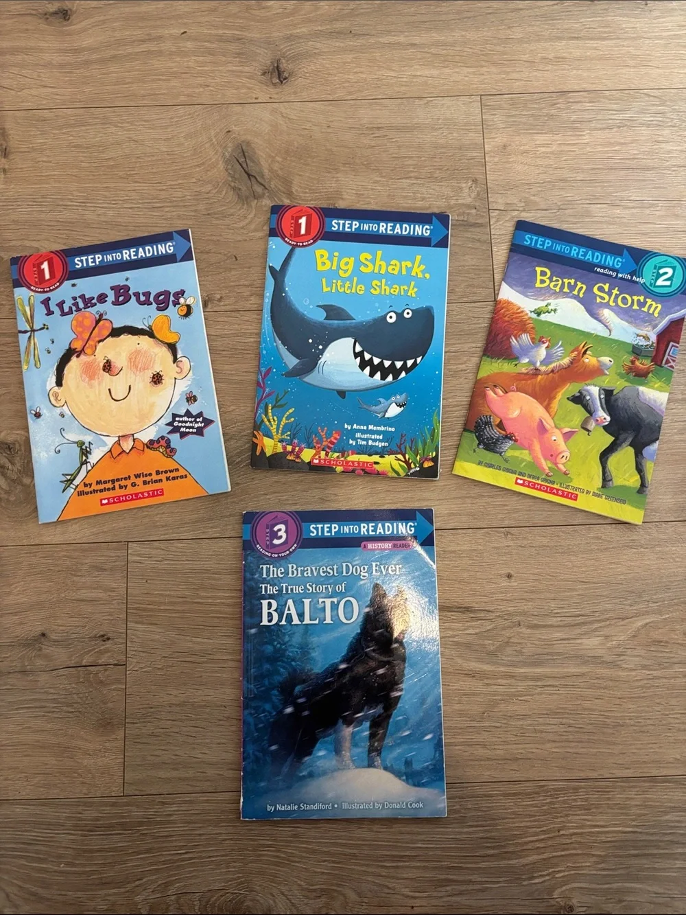 Scholastic Step into Reading Book Set - Blue, Yellow, Pink, Purple Covers